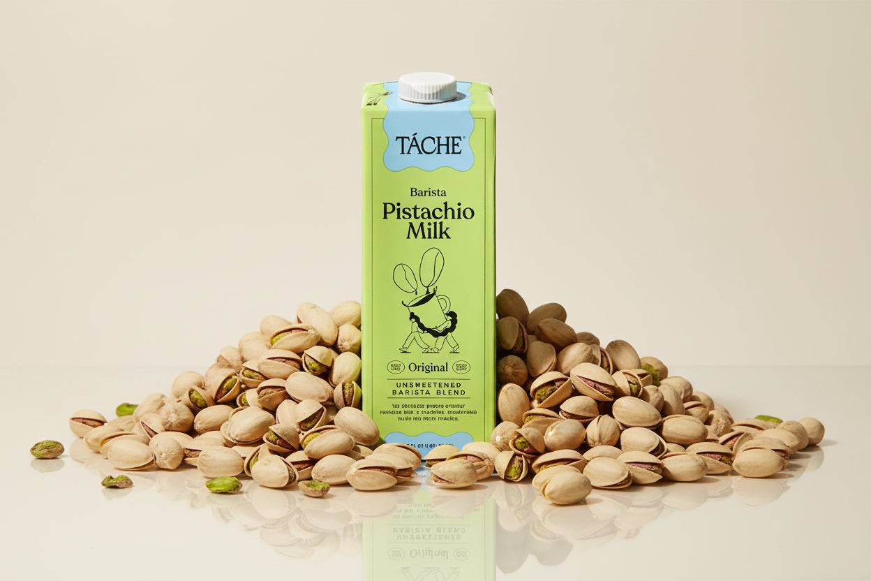 Carton of Táche Pistachio Milk on a white background