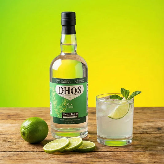 Bottle of DHOS gin with a glass of gin and tonic on a wooden surface with a green and yellow gradient background.